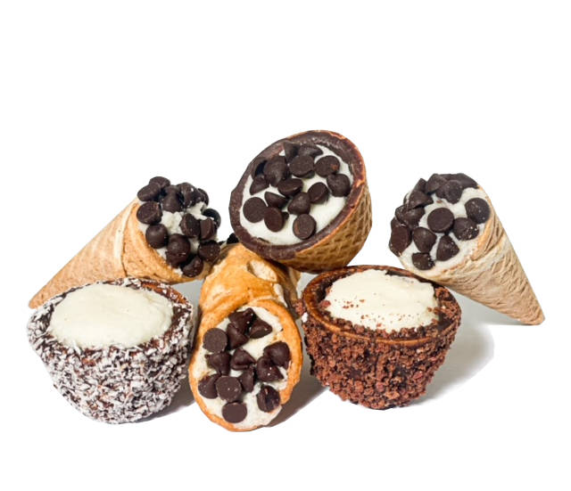 Assortment of Cocchini, mini coconut desserts, an Italian artisanal product by Calfra.