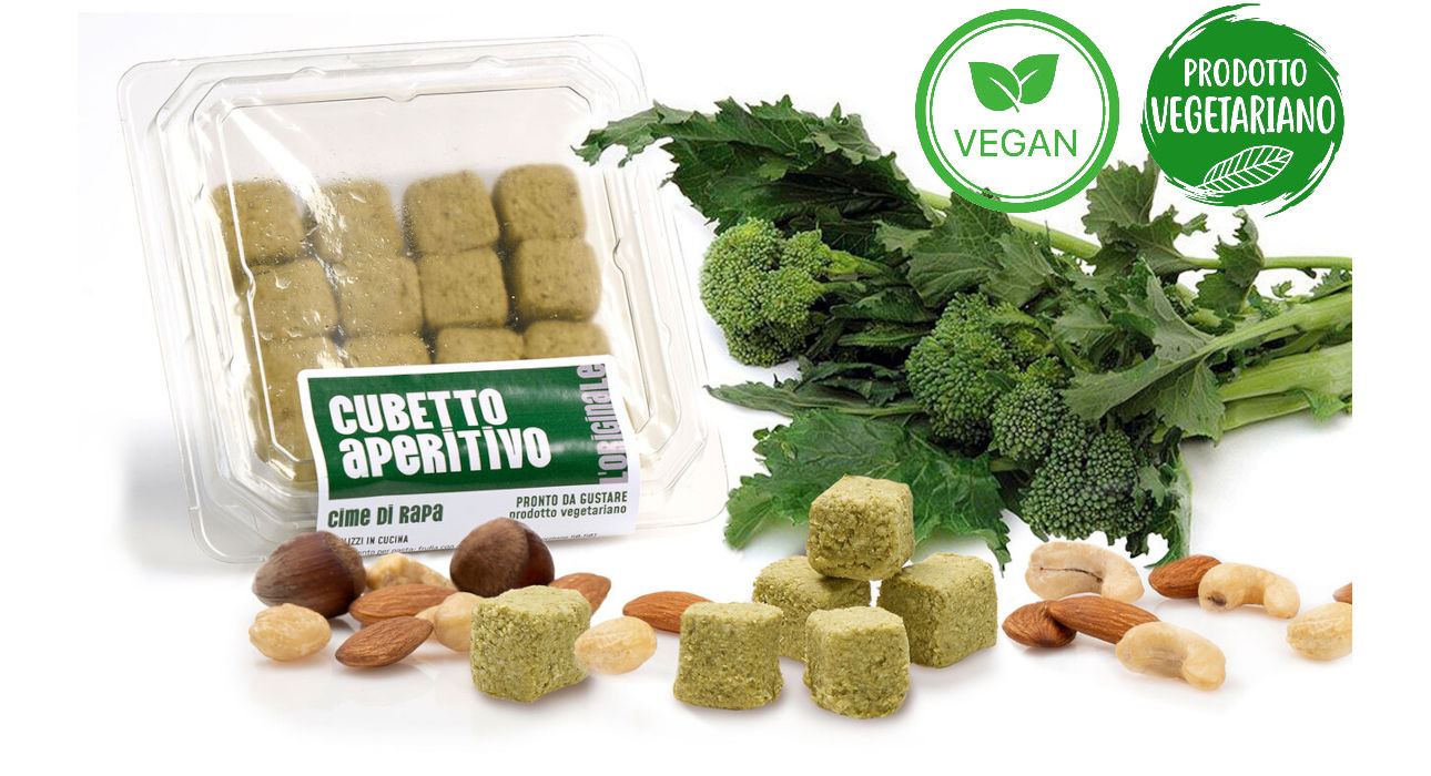 Frutta secca e cime di rapa Vaschetta di L'Originale patè in cubetti Calfra con frutta secca e cime di rapa, prodotto vegano e vegetariano, ricco di fibre, proteine e vitamine
