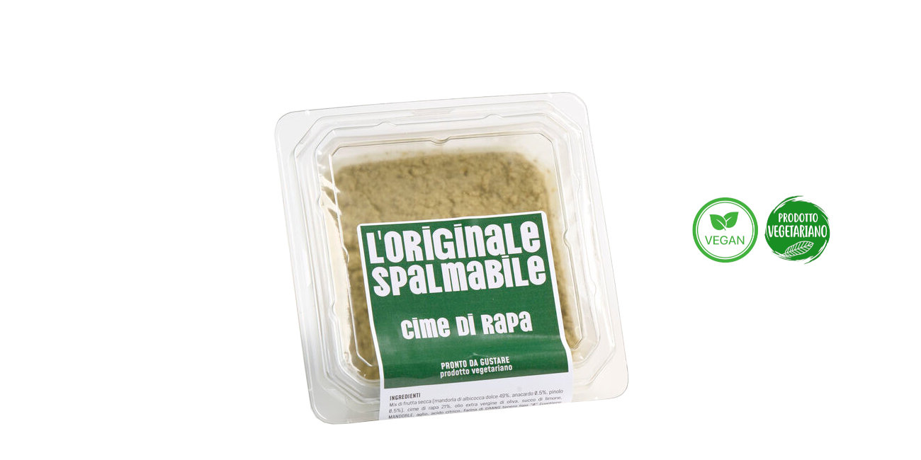 Vaschetta di L'Originale spalmabile Calfra con frutta secca e cime di rapa, prodotto vegano e vegetariano, ricco di fibre, proteine e vitamineuct rich in fiber, protein, and vitamins